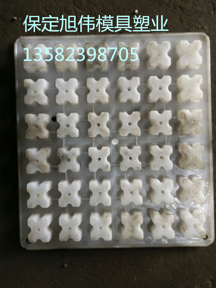 供应梅花形水泥垫块专用手工塑料模具