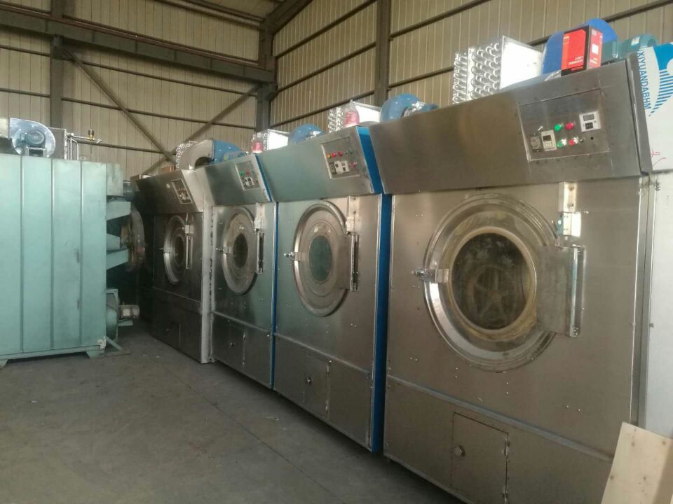哈密出售二手30公斤洗布草水洗机设备，二手单滚烫平机