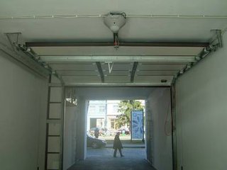 天津宁河县安装车库门，天津定做翻板车库门厂家