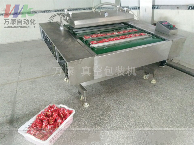 万康直销卤蛋真空包装机   连续滚动式真空包装机