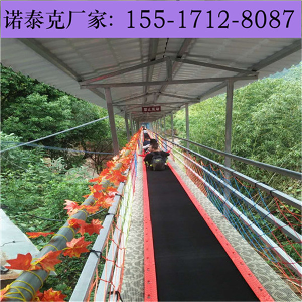 景区爬坡输送带自带感应装置 雪地电梯魔毯皮带自动校直